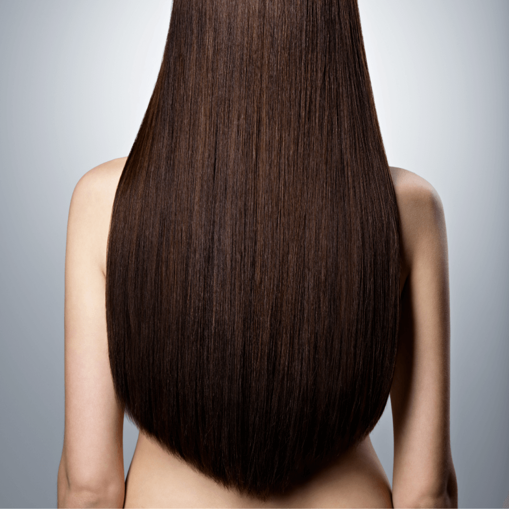 mujer de espaldas con cabello oscuro
